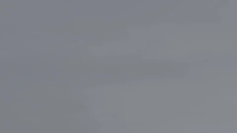 Tilt down from sky to Canadian flags in harbour Stock Footage 127043949
