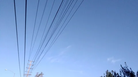 Tilt down from sky to empty Los Angeles concrete water river channel. Stock Footage 99615158