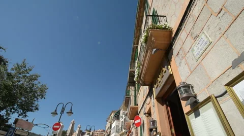 TILT down Spanish Shops Sidewalk Stock Footage 58815102