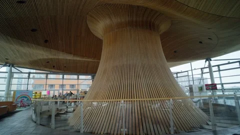 Tilt down of spectacular architecture of the Welsh parlaiment or Sennedd Stock Footage 329511140