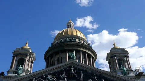 Tilt down of St Isaac's Cathedral in Saint Petersburg with blue sky background Stock Footage 103288942