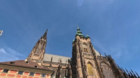 Tilt Down of St. Vitus Cathedral at Prague Castle with Tourists and Sunny Blue Stock Footage 346965186