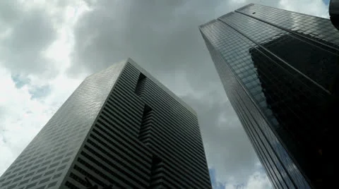 Tilt down to street from Skyscrapers 스톡 동영상 24854635