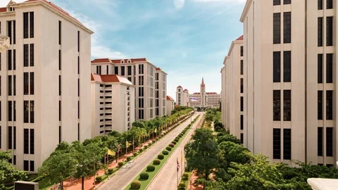 Tilt down Sunny to cloudy timelapse of main road in Assumption University (ABAC) Stock-Footage 113352736