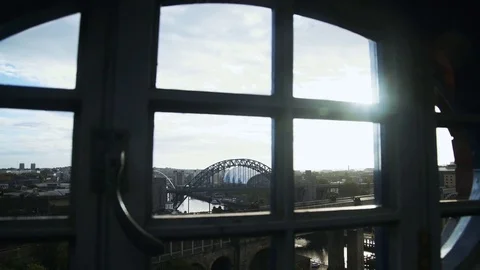 Tilt down through window frame Tyne Bridge Stock Footage 81135797