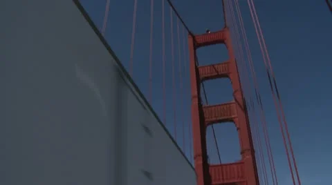 Tilt down from the top of the bridge to traffic Driving away Stock Footage 10845164