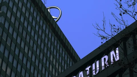 Tilt down from top of building complex Europa-Center in the evening in Berlin Stock Footage 129932988