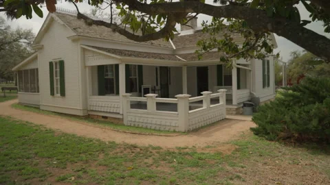 Tilt Down from Tree to LBJ Home Stock Footage 235875720