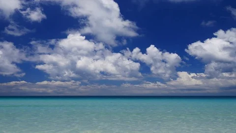 Tilt down UHD camera shot of the exotic turquoise water tropical seascape Video stock 70040316