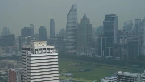 Tilt Down View Of City Skyline Covered In Heavy Smog And Air Pollution Stock Footage 337709101
