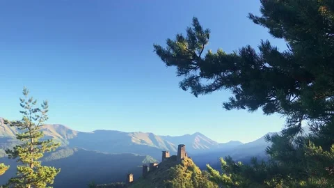Tilt down view to keselo medieval fortress on the hill during sunset light. H Stock Footage 146316288