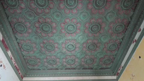 Tilt down view of an ornamented ceiling on an abandoned villa 動画素材 345730567