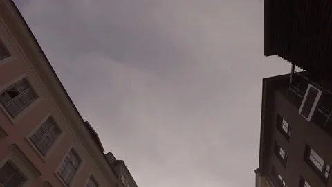 Tilt down walking through old town Estonia Tallinn Stock Footage 77054816