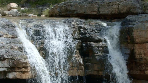 Tilt down on a waterfall Stock Footage 158061747