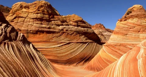Tilt down of The Wave sandstone rock formation in Coyote Buttes, Nevada. Stock Footage 107951256