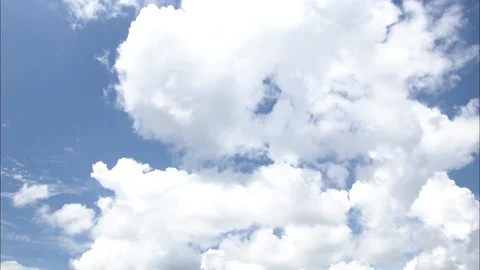 Tilt down of white clouds over football practice field Stock-Footage 105423260