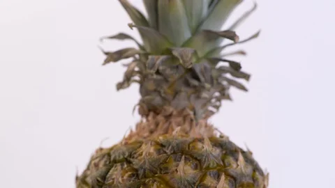 Tilt Down of Whole Pineapple Video stock 130136538