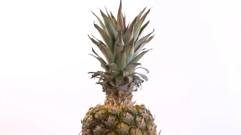 Tilt Down of Whole Pineapple Rotating 스톡 동영상 130135730