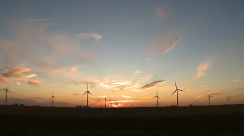 Tilt down to Wind Farm Turbines at Sunset Stock Footage 32935959