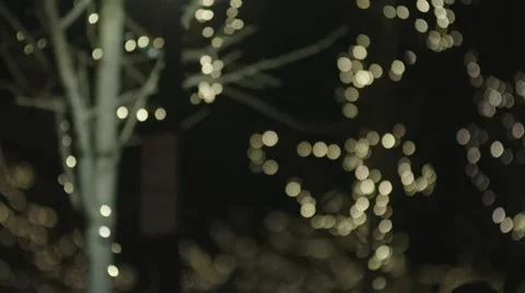 Tilt down of young couple during Christmas on cell phone Stock Footage 59458793