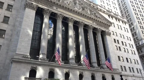 Tilt up the facade (4k) of the New York Stock Exchange, Broad Street, New York. Stock Footage