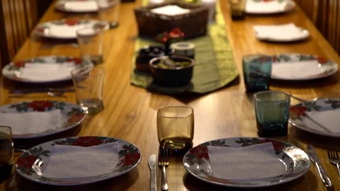 Tilt Up of Formal Dining Table Set with Dishes, Silverware, and Glasses Stock Footage 70875894