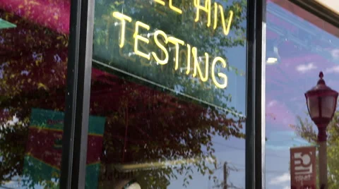 Tilt on Free HIV Testing Sign in Dallas Texas Stock Footage 51552843