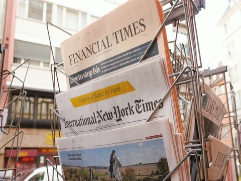 Tilt-up to French press reporting about Bataclan Terrorist attack in Paris Stock Footage 80623853