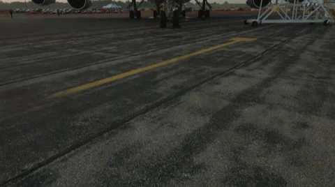 Tilt up to front view of Jumbo Jet at dawn 4K Stock Footage 42734198