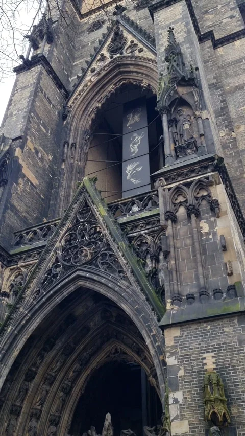 Tilt up the Gothic tower of the St Nikolai memorial Hamburg Germany Vídeos de archivo 341266927