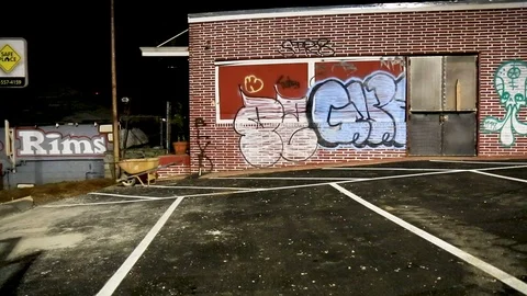 Tilt up of graffiti at side of building Stock Footage 86477991