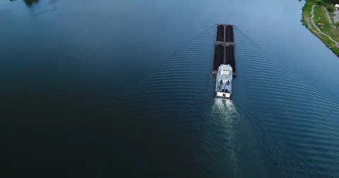 Tilt Up High Angle Wide Establishing Shot of Coal Barge on Ohio River Stock Footage 99163501