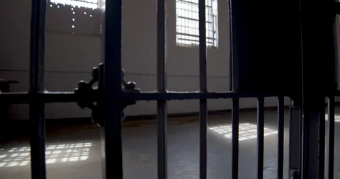 Tilt on a jail cell door Stock Footage 89491476