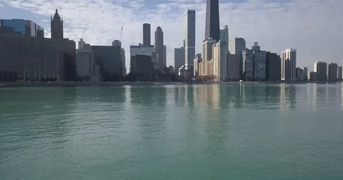 Tilt Up from Lake Michigan To Chicago's Gold Coast Neighborhood Stock Footage