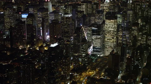 Tilt-up to look over Midtown Manhattan at night. Shot in 2011. Stock Footage 59172195