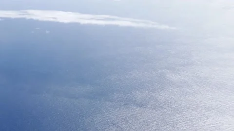 Tilt from Ocean to the Clouds over the Blue Pacific Ocean Stock-Footage 201489207
