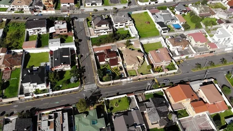 Tilt up over a suburb of Quito, Ecuador, the Valle de Los Chillos Stock Footage 128993436