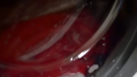 Tilt Over A Washing Machine In Function, Spinning Laundry Detail Video stock 70165262