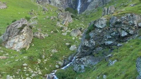 Tilt up to Raisko Praskalo waterfall, the highest waterfall in Bulgaria. Near Stock Footage 298131069