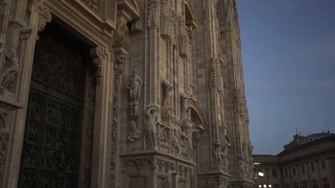 Tilt up real time medium shot of a Milan Cathedral. A popular tourist place of Stock Footage 122290667