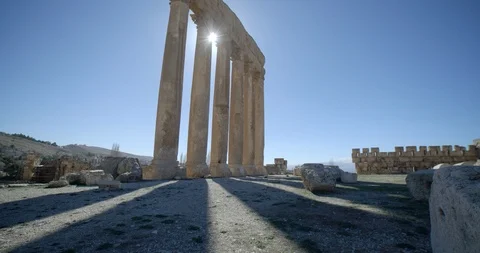 Tilt up on remaining columns of Temple of Jupiter, Baalbek, Lebanon Stock Footage 118999000