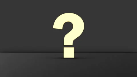 Tilt Up Reveal of 3D Yellow Question Mark on Black Floor Surface. Stock Footage 342307047