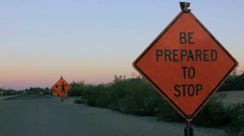 Tilt to Reveal a Be Prepared to Stop Sign Stock Footage 64364931