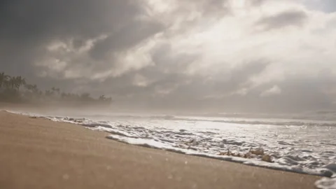 Tilt Up To Reveal Beautiful Beach with Dramatic Weather 4K Stock Footage 267048476