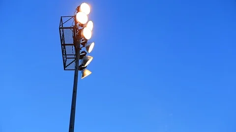 Tilt Up Reveal of Stadium Light with Blue Night Sky - Shallow Depth of Field Stock Footage 106921201
