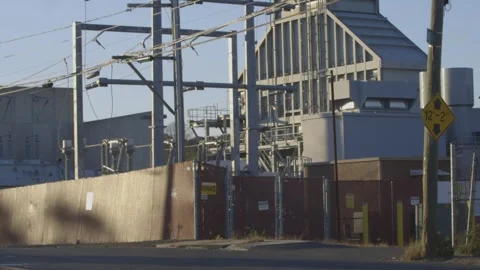 Tilt up from road to power lines Stock Footage 304373472