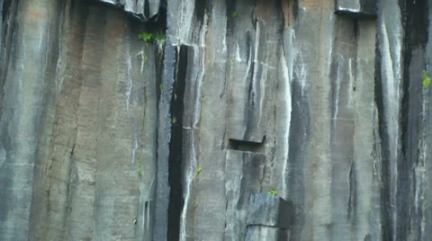 Tilt on rocky formation of hexagonal basalt Stock Footage 37986683