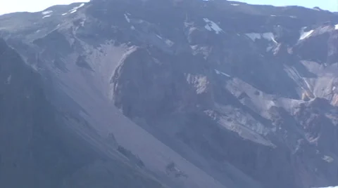 Tilt from scree down the slope to the glacier Stock Footage 37892889
