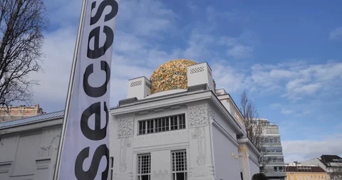 Tilt from “Secession” down to “Naschmarkt” next to a busy street Stock Footage 106492961