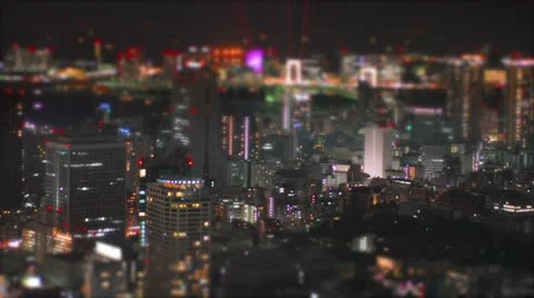 Tilt-shift aerial time-lapse shot of Tokyo's busy city roads. Video stock 11183069